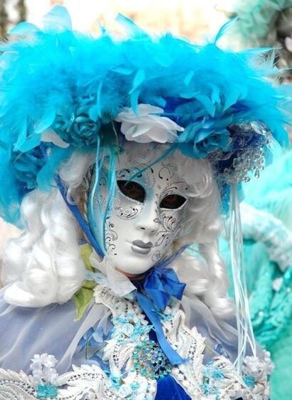 Carnaval - Chapeau de plumes turquoises